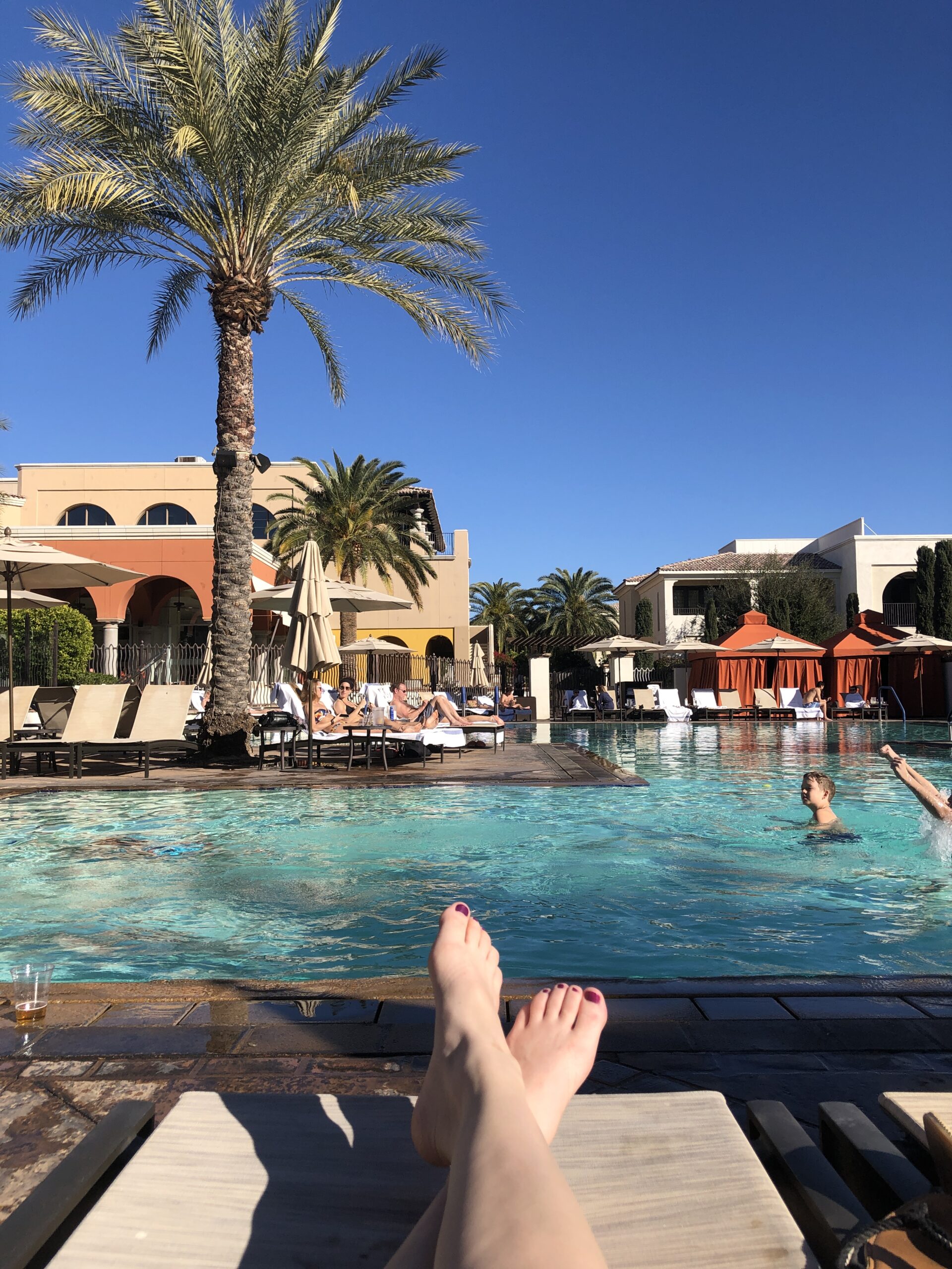 Feet by pool in scottsdale